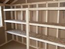 10x16 Peak Style Storage Shed Interior with Shelves